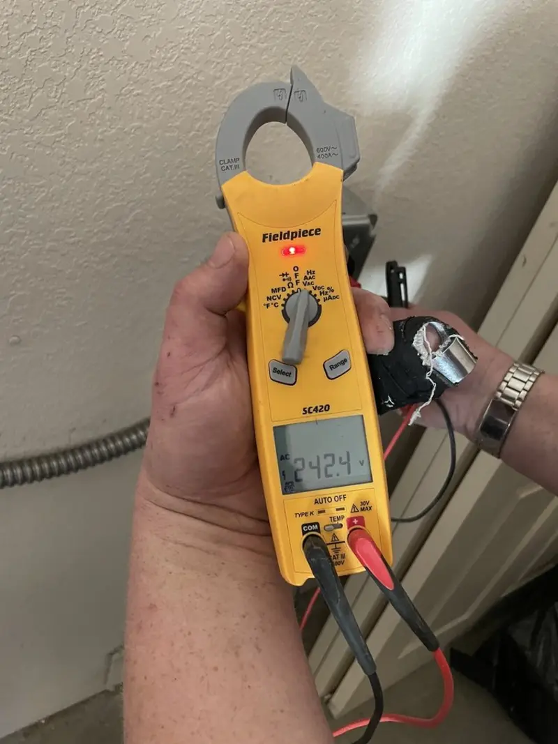 Voltage testing with clamp meter during Generator Installation in Kendale Lakes